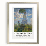 Textured art print of abstract design in muted green and blue tones on a framed silver canvas.