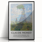 Large abstract wall art featuring a Monet-inspired design in muted blues and greens on a framed acrylic.