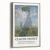Framed canvas of Claude Monet's landscape painting in muted green and blue tones, ideal for bedroom wall art.
