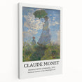 Side view of a Claude Monet-inspired stretched canvas depicting a tranquil pond scene in soft green and blue tones.