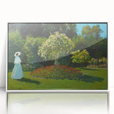 Acrylic print of Claude Monet's impressionist painting, featuring soft pastel colors, framed in white.