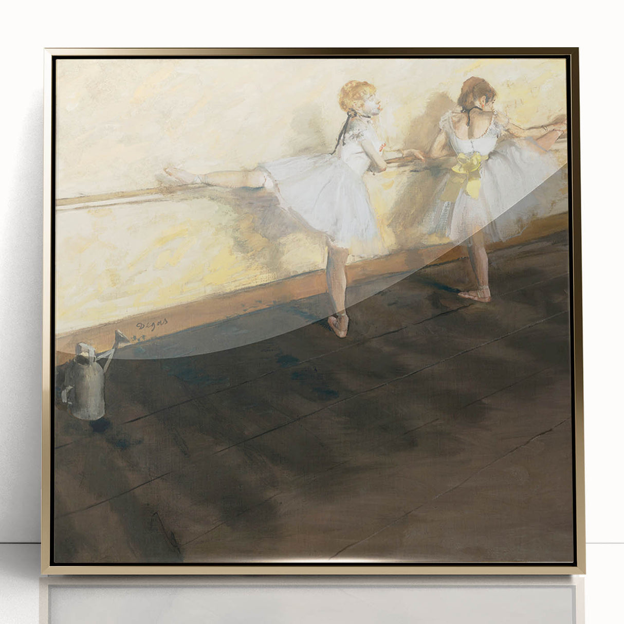 Large art print of Edgar Degas' dancers in pastel shades, framed in gold acrylic.