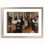 A textured art print of an abstract Edgar Degas ballet dancer in muted pastel shades, framed in silver.