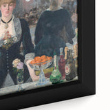 Close-up of a textured black wall art piece depicting a colorful, abstract design on a framed canvas.