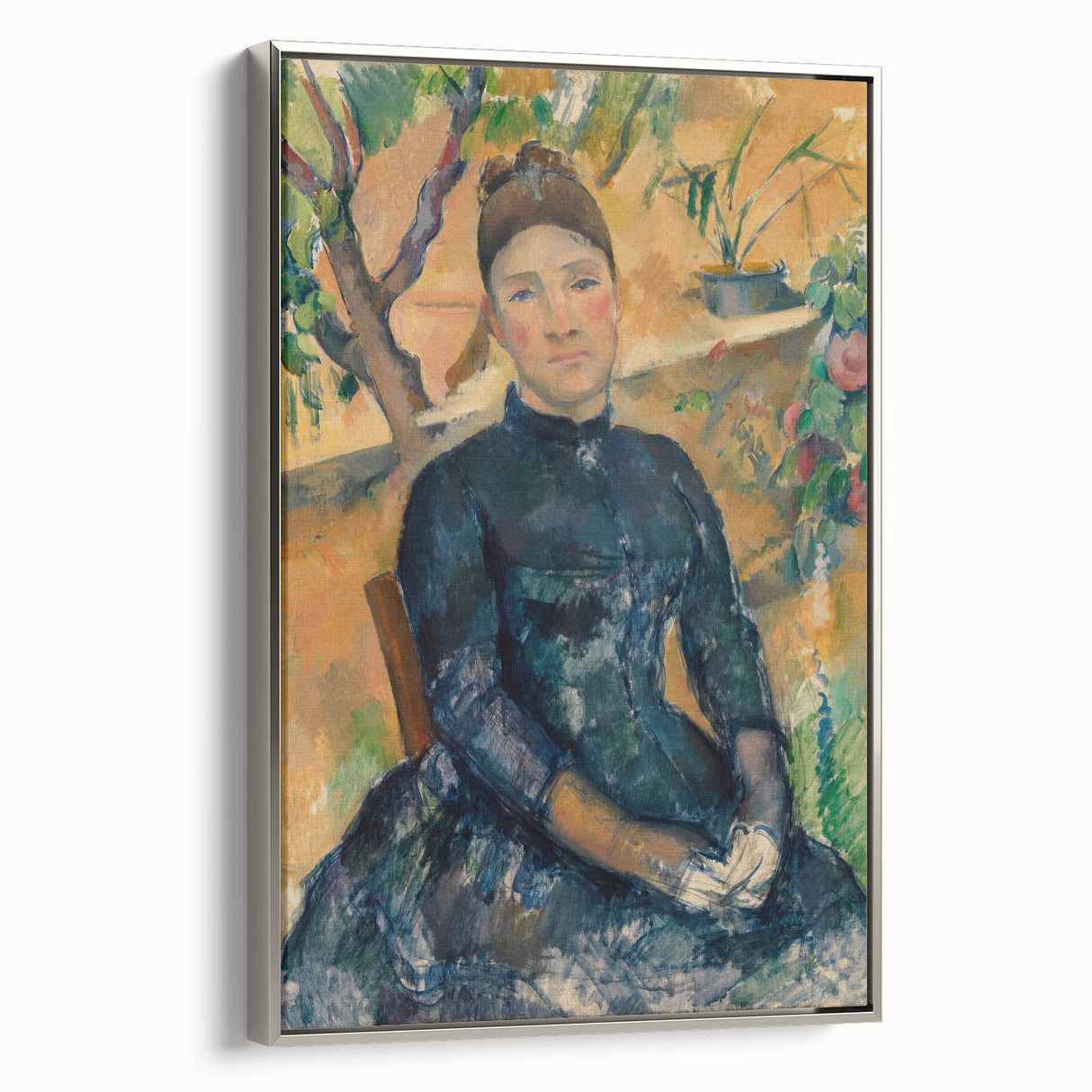Framed canvas of a Paul Cézanne landscape painting, featuring muted earth tones with a silver frame.