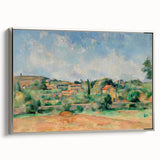 Landscape painting by Paul Cézanne featuring colorful trees and a house, printed on a silver-framed canvas.