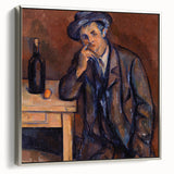 Framed canvas of a Paul Cézanne landscape painting with colorful foliage and a mountain backdrop.