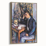 Framed canvas featuring a vintage-style landscape painting by Paul Cézanne with muted earth tones.