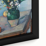 Close-up of a textured black wall art featuring Paul Cézanne's colorful impressionist style on a large framed canvas.