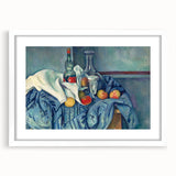 Abstract art print of a Paul Cézanne design in white frame with mat, featuring muted earth tones.