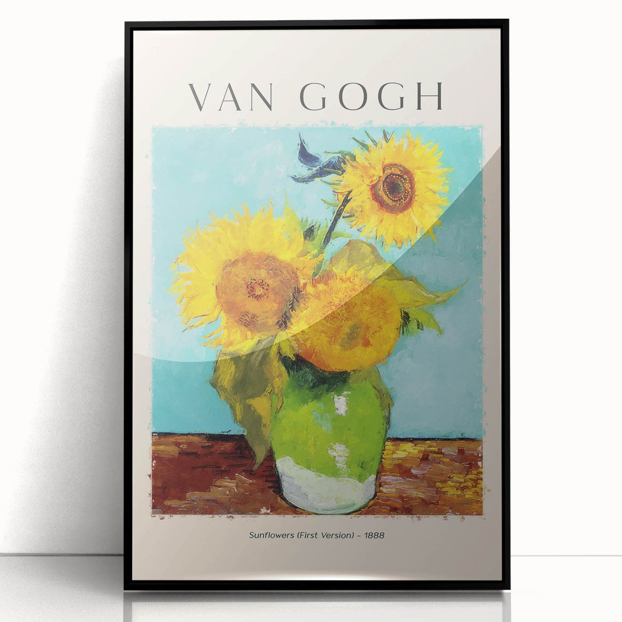 Large abstract wall art depicting a swirling mix of blue and yellow tones on a black framed acrylic print.