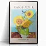 Large abstract wall art depicting a swirling mix of blue and yellow tones on a black framed acrylic print.
