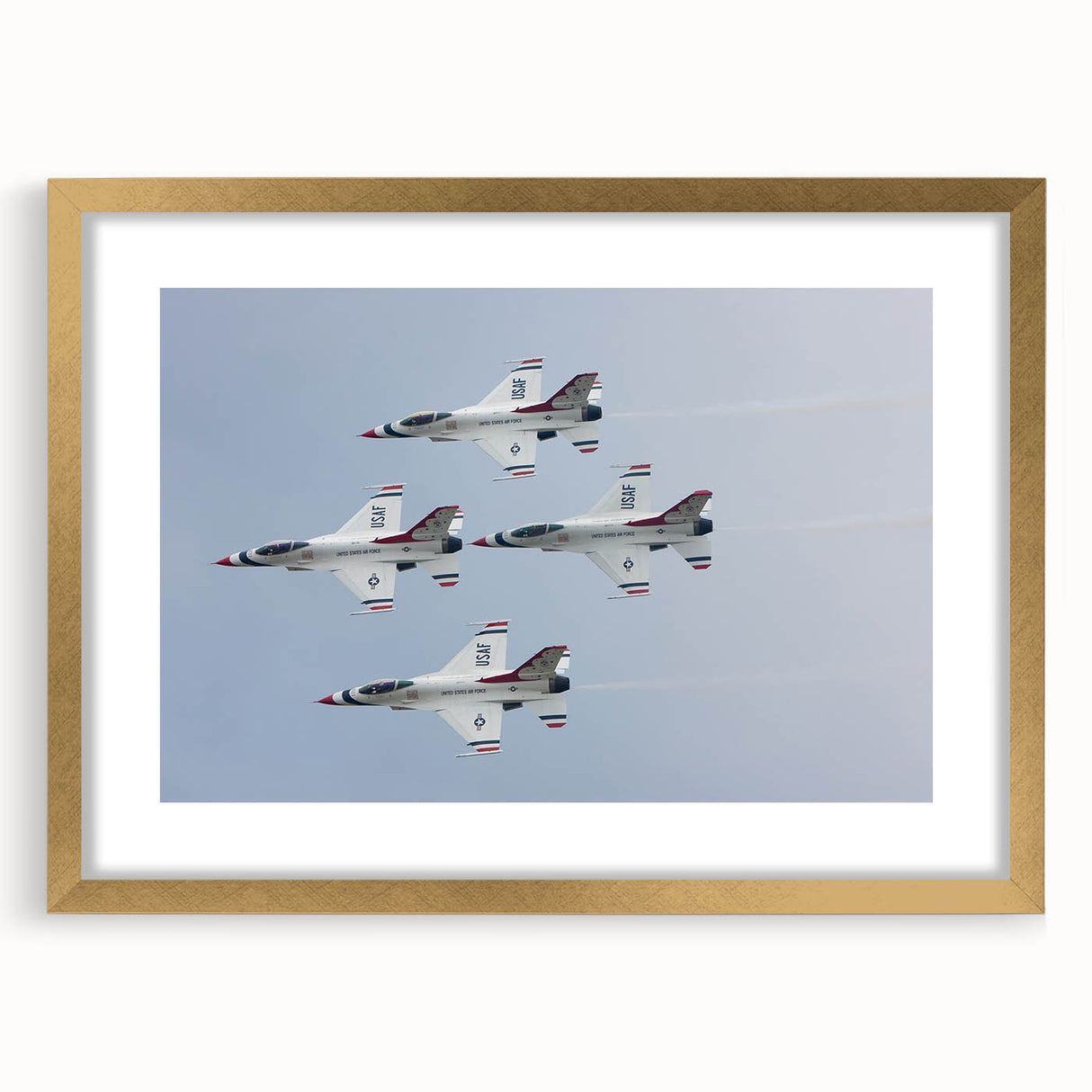 Abstract airplane design in gold and black on a framed print, ideal for modern dining room decor.