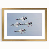 Abstract airplane design in gold and black on a framed print, ideal for modern dining room decor.