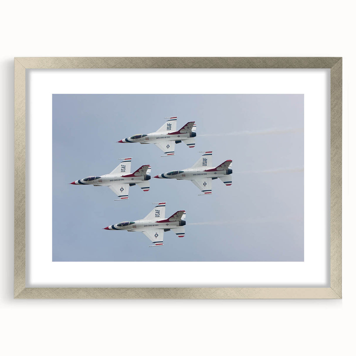 Textured abstract art print of an airplane, rendered in cool gray tones on a framed silver mat.