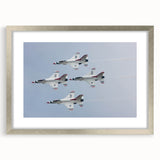 Textured abstract art print of an airplane, rendered in cool gray tones on a framed silver mat.