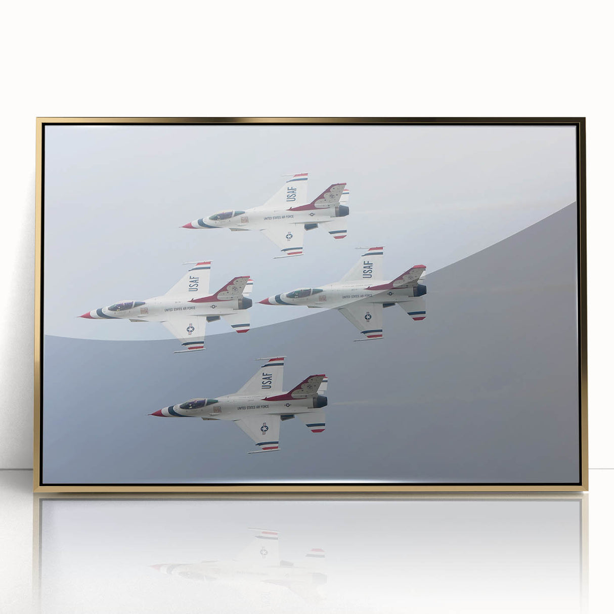 Large abstract wall art featuring a mid-century modernist airplane design in gold and black, framed in acrylic.