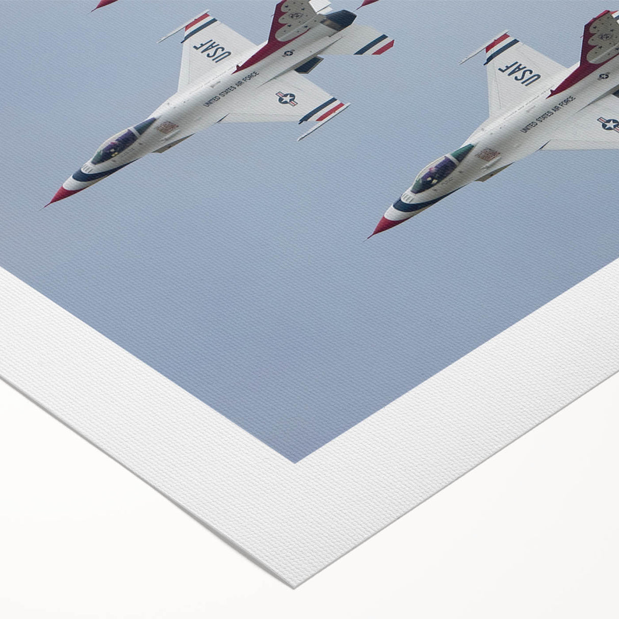 Art deco poster featuring a stylized vintage airplane in muted silver and blue tones on rolled canvas.