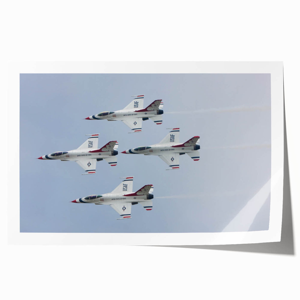 Art deco poster of a vintage airplane in muted silver and blue tones on rolled print, suitable for dining room wall art.
