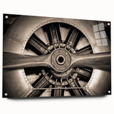 Side view of an airplane depicted in large abstract style on acrylic glass, in shades of gray and blue.