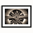 Abstract art print featuring a colorful, textured airplane design on an extra-large black-framed canvas.