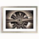Textured abstract art print of airplanes in muted gray and blue tones on a framed canvas, suitable for bedroom decor.