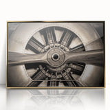 Large abstract wall art featuring a mid-century modernist airplane design in gold tones on framed acrylic.