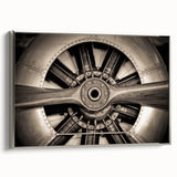 Framed canvas featuring a vintage poster of a colorful airplane landscape.