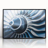 Framed acrylic print featuring a mid-century modernist airplane design in black and white, ideal for nursery wall decor.