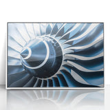 Large abstract wall art featuring a mid-century modernist airplane design in muted gray and blue tones on a framed acrylic.