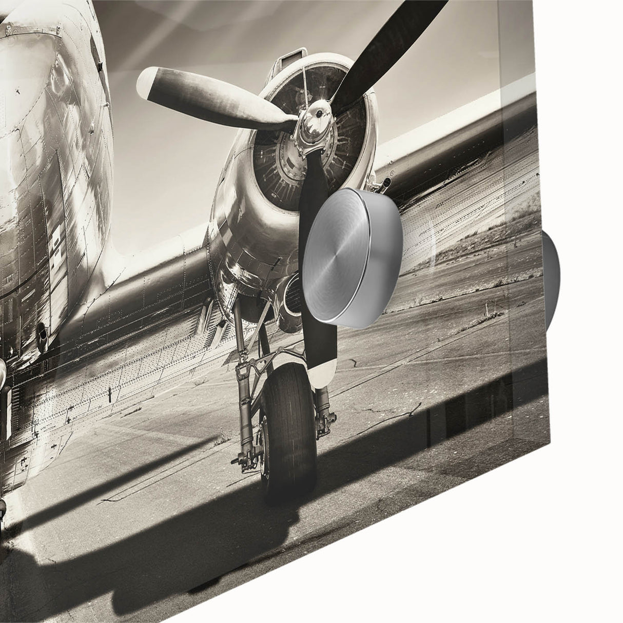 Large abstract acrylic print featuring an airplane design in muted metallic tones, ideal for bedroom or dining room art.