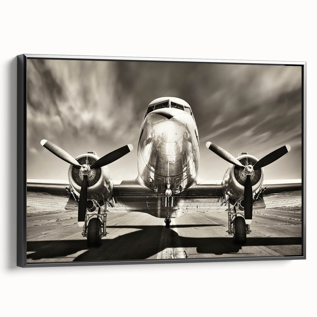 Black and white framed canvas of a vintage airplane, ideal for bedroom wall decor.