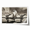 Art deco poster featuring a 1930s airplane, in muted silver and blue tones on rolled print.