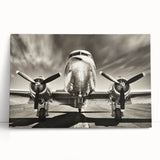 Black and white photo of a vintage airplane on stretched canvas, ideal for kitchen wall art or bedroom ambiance.
