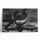 Black and white photo of an airplane in flight on a stretched canvas, ideal for kitchen wall art or bedroom ambiance.