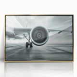 Large abstract wall art featuring a mid-century modernist airplane design in gold and black, acrylic print framed.