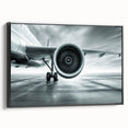 Framed canvas featuring a vintage black airplane on a muted background, ideal for bedroom wall art.
