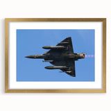 Extra large abstract art print of an airplane in textured gold and blue tones on a framed canvas.