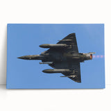 Black and white photo of an airplane in flight on a stretched canvas, suitable as large wall art for kitchens or bedrooms.