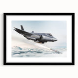 Abstract art print featuring a colorful airplane design on textured canvas, framed in black.