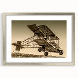Textured abstract art print of an airplane in grayscale, framed in silver, suitable for bedroom decor.
