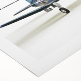 Art deco poster of an airplane with geometric shapes and metallic shades, printed on rolled canvas.