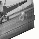 Large abstract wall art featuring a close-up of an airplane in monochrome, printed on acrylic glass.