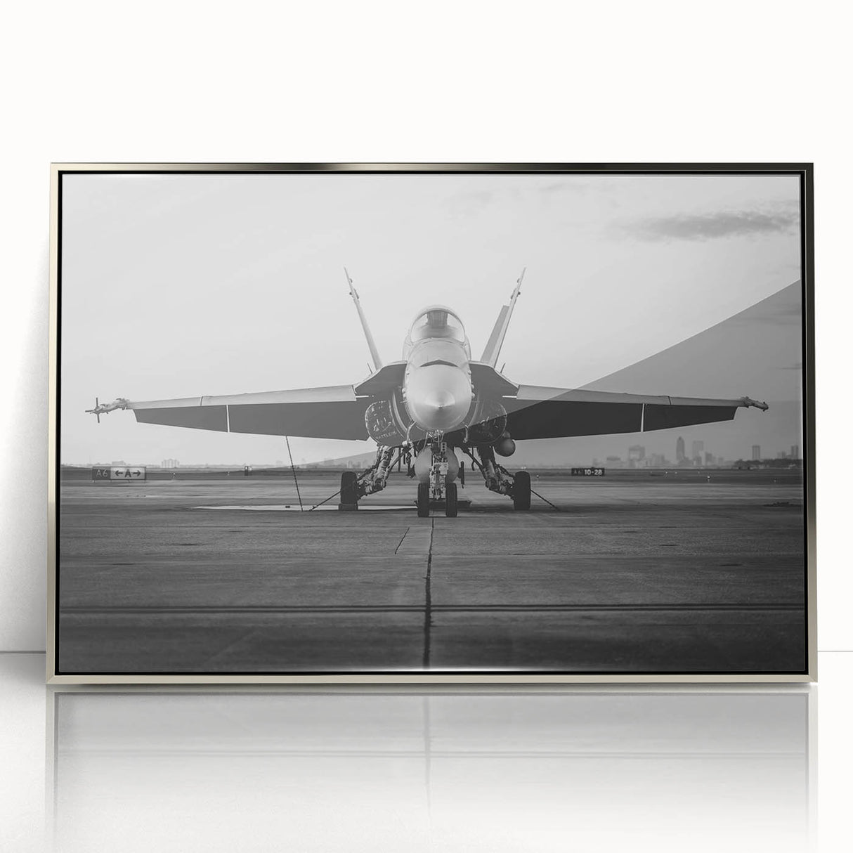 Large abstract wall art depicting an airplane in mid-century modernist style, framed in silver acrylic.