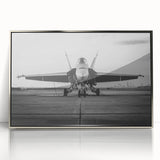 Large abstract wall art depicting an airplane in mid-century modernist style, framed in silver acrylic.