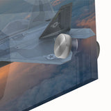 Close-up of a large abstract airplane design in gray and blue tones on acrylic glass.