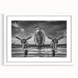 Extra large abstract art print of an airplane, in textured grey and blue tones on a white framed canvas.