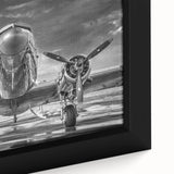 Extra large black wall art featuring a colorful, textured depiction of airplanes on a framed canvas.