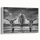 Framed canvas depicting a vintage airplane, rendered in black with colorful accents, ideal for a study or office wall.