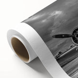 Art deco style airplane illustration in muted blue and gray tones on rolled canvas, suitable for nursery wall art.